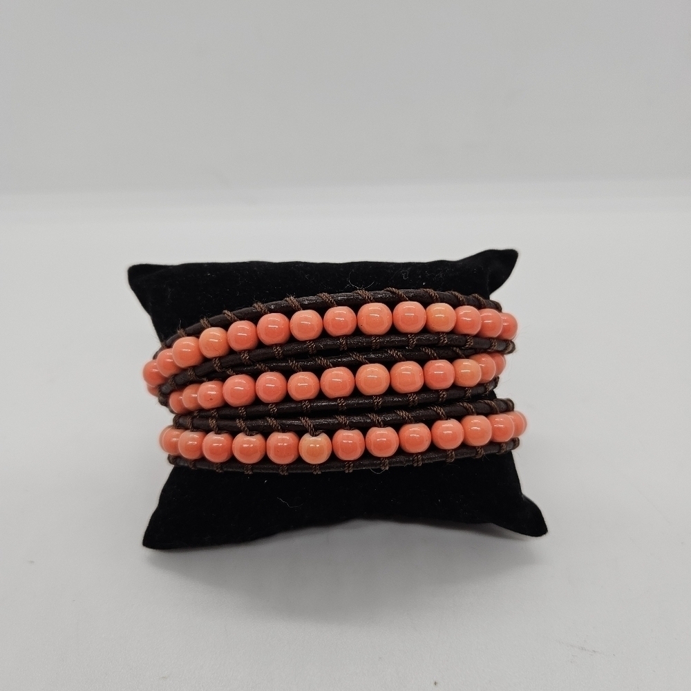 brown leather cord wrap bracelet with coral orange beads